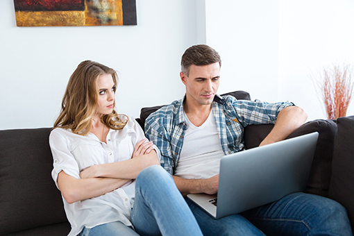 Orlando Wife Looking Angrily at Husband During Online Christian Marriage Counseling