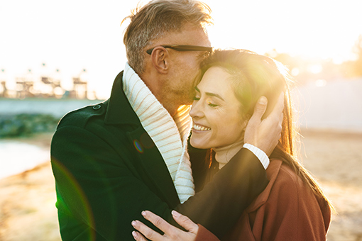 Husband Hugging Smiling Wife After Completing Christian Adultery Counseling