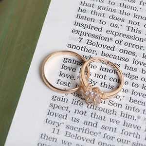 Wedding Ring and Bible of Christian Couple Looking for Marriage Counseling Services